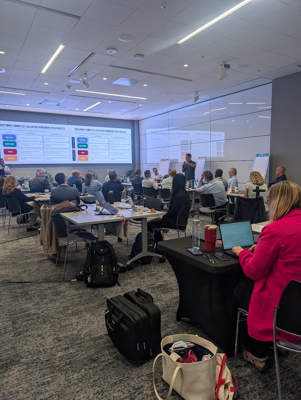 Training room at Pacific Life with employees at tables